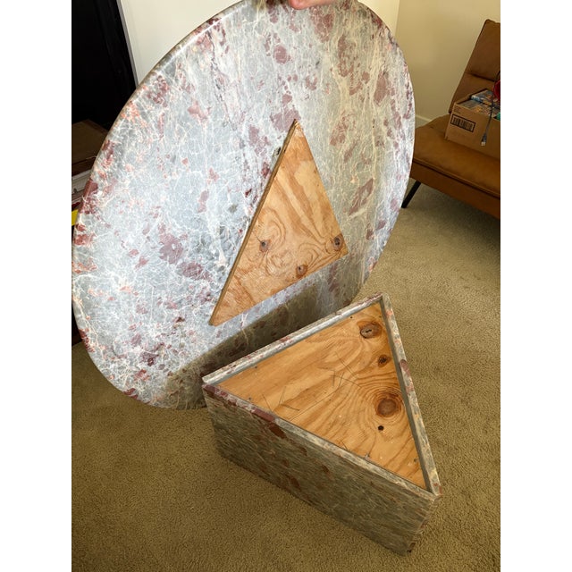 Vintage 3-piece real marble table set consisting of one large round coffee table and two matching end tables. The marble...