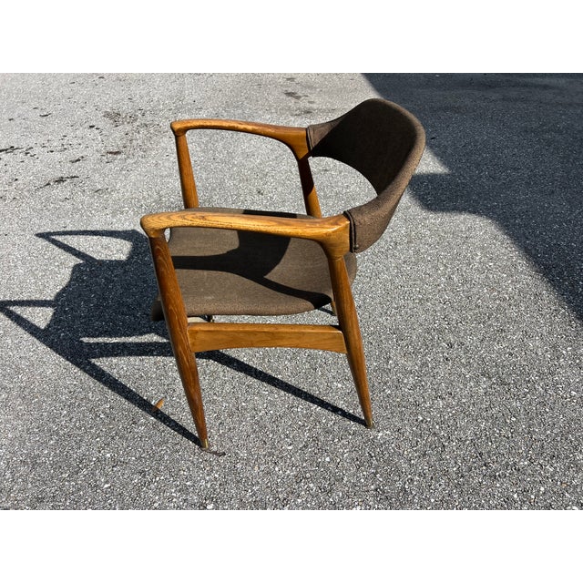 Figured walnut armchair, stunning brass corner detail, amazing Mid-Century Modern design, superior quality and...