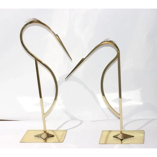 1960s-70s Brass Stylized Egret Figures - a Set of 2 This stylish two piece set of stylized egrets dates to the...