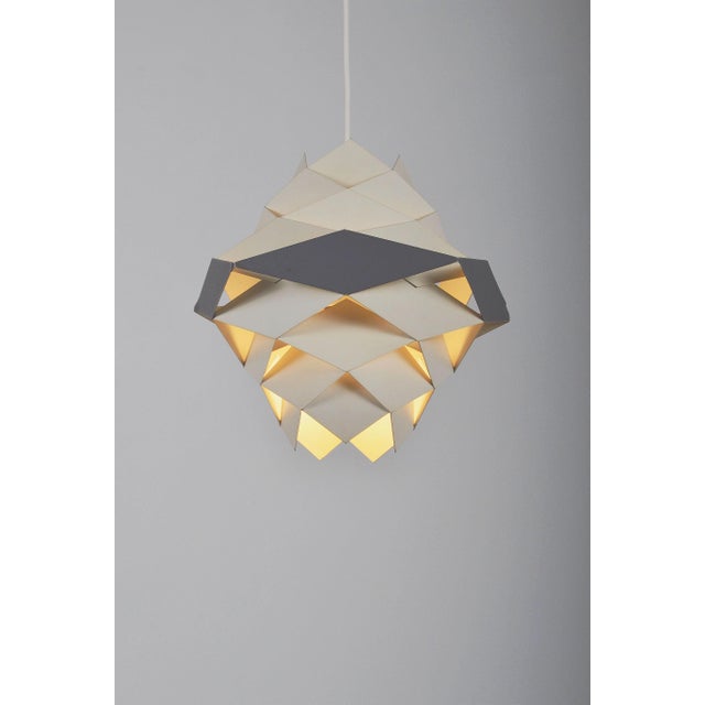 Danish hanging lamp 'Symphoni' designed in the 1960s by Preben Dal. This origami-shaped lamp was made by Hans Følsgaard...
