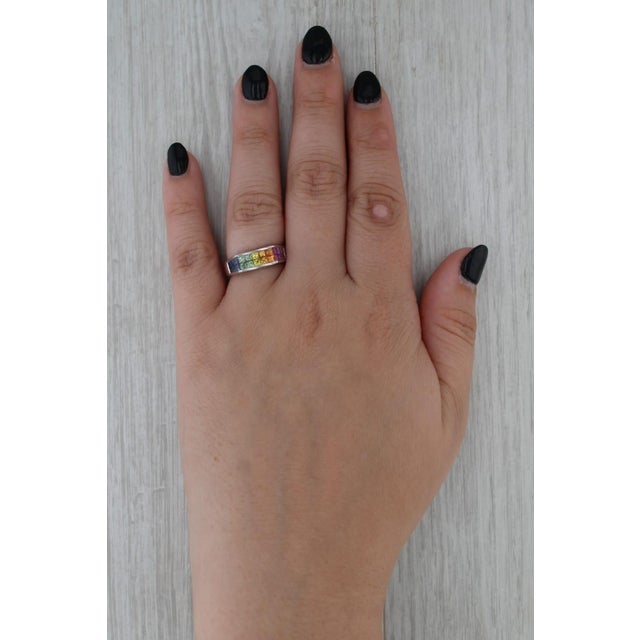 Gemstone Information: - Natural Sapphires - Total Carats - 0.70ctw Cut - Princess Brilliant Color - Multicolor Treatment -...