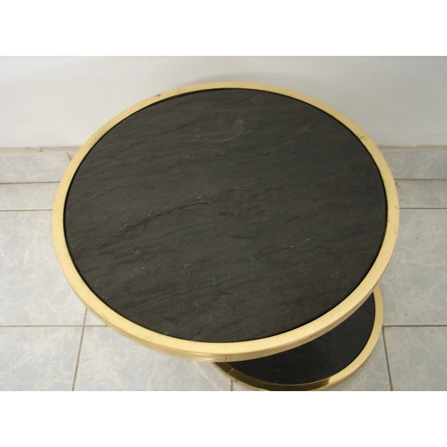 Awesome side table for many uses. A very heavy piece. Made in the mid 20th century.