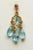 Pair of exquisite 22K Gold dangle chandelier earrings with clusters of five faceted, oval blue topaz gemstones coupled...