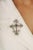 Inspired by Gothic Revival architecture, this elegant brooch pendant is crafted in 925 sterling silver and features 3.55...