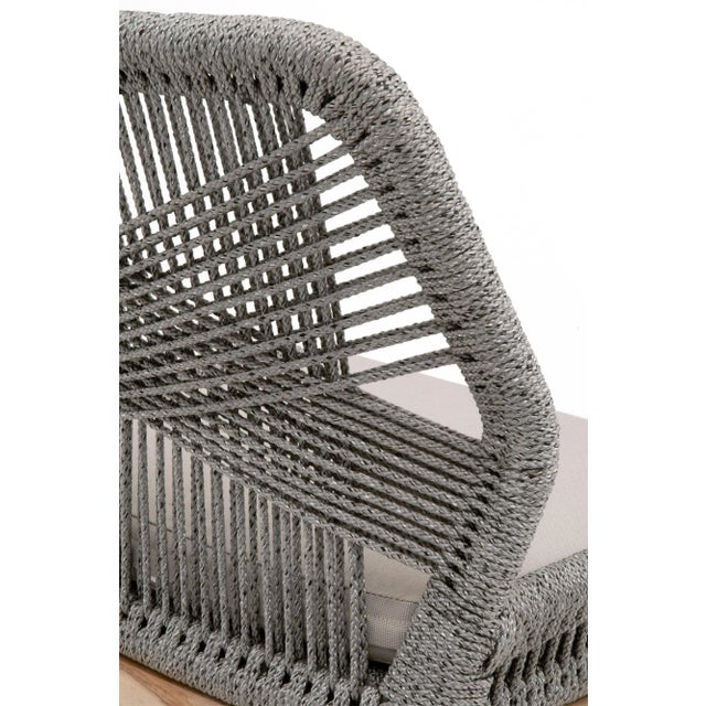 This woven outdoor counter stool will add a touch of coastal style to your backyard or patio. Constructed with a...