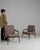 This pair of armchairs carries genuine presence, its taupe/mauve upholstery, dark wood angled legs immediately setting the...