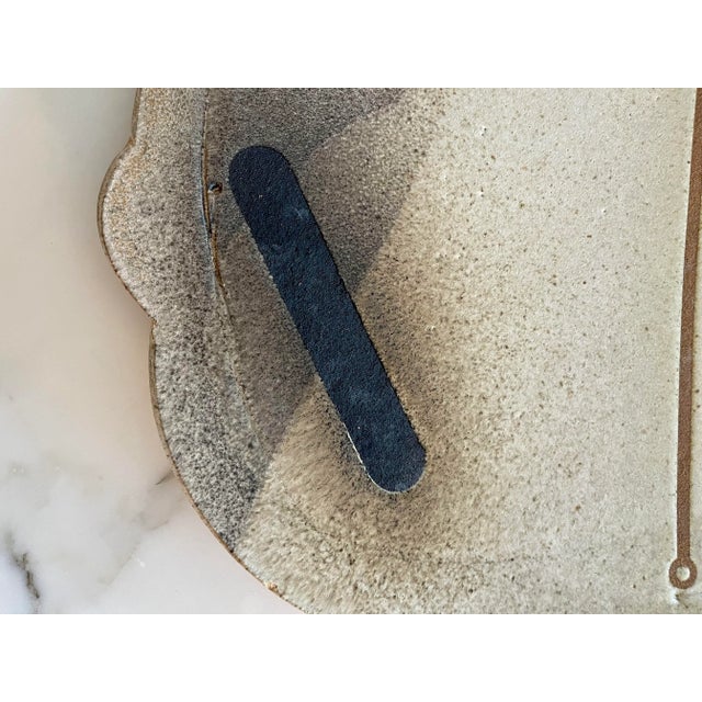 "George Roby is a respected Ohio potter, sculptor, and teacher. His work includes large, expressive slab and coil built...