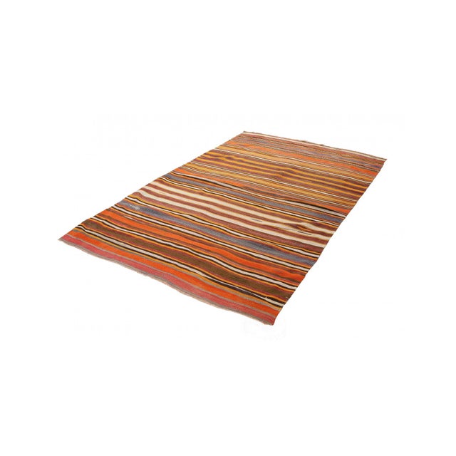 Handwoven vintage striped decorative kilim rug from Denizli region of Turkey. Approximately 50-60 years old. In very good...