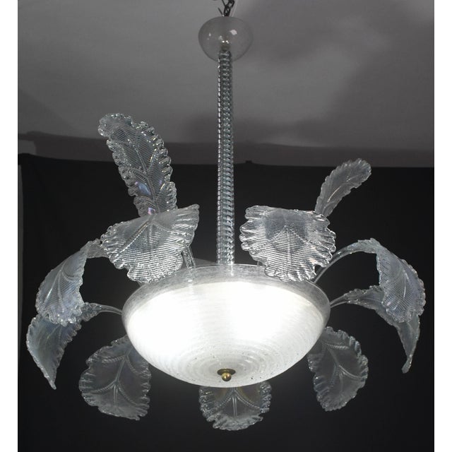 Art Deco chandelier made by the Barovier & Toso glassworks in the 1940s and 1950s. This chandelier's unique feature is the...
