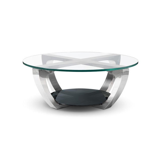 Modern stainless steel and glass cocktail table designed by Greg Sheres. Our Beautiful modern “Celest” stainless steel...