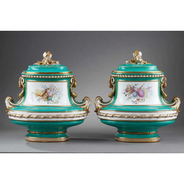 Large pair of vases with green background called «green garden» in porcelain resting on a base with gold flutings. The...