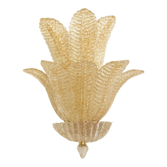 Shenographic wall sconce in Mrano glass. Leaves in gold graniglia, metal frame in white A piece of hight italian hand-...