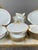 Superb Limoges porcelain dinner service, marked U.C Limoges France, reflecting French craftsmanship and the timeless...