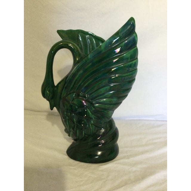 Beautiful vintage green swan vase with blue details that create an iridescent effect in the light, in excellent condition...
