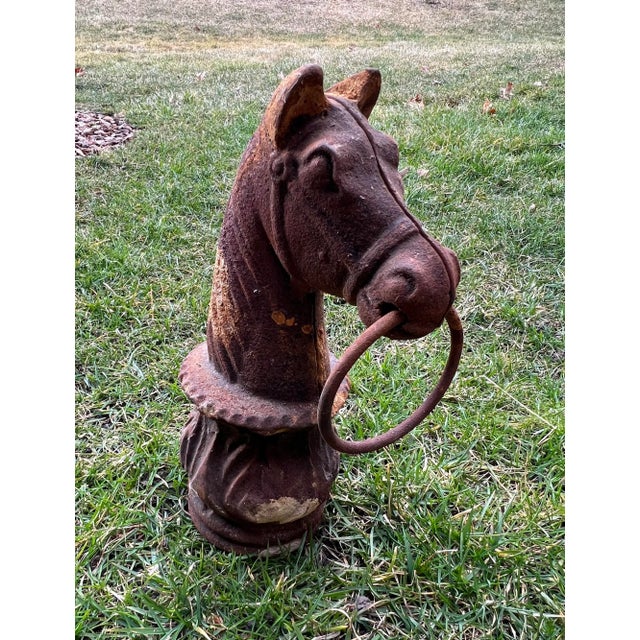 For sale is a uniquely detailed cast iron horse head hitching post. The post opening is right about 3 1/2” round.