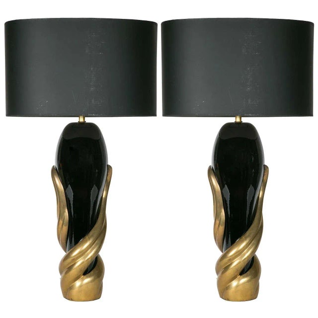 This pair of lamps in black opaline and bronze was designed around the 1980s. The dimensions below are given without the...