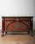 A striking 19th century French Empire style mahogany sideboard or credenza, richly adorned with finely cast gilt bronze...