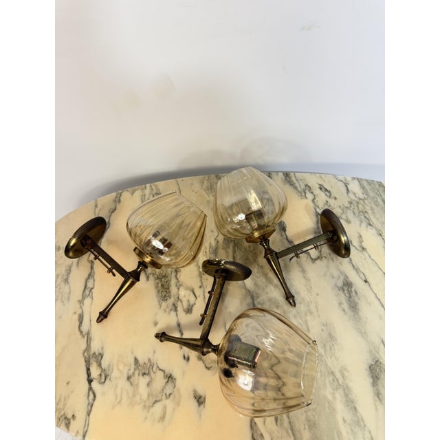 Set of 3 brass and Murano glass wall lamps, 1970 Intact and in good condition Height 28 cm Width 14 cm Depth 20 cm...