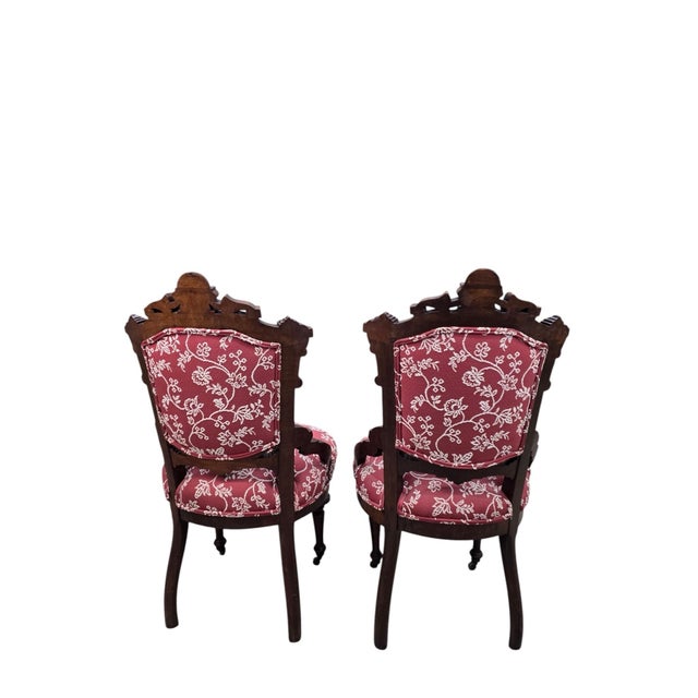 Antique Victorian Carved Walnut Parlor Chairs with Original Casters - Pair Elegant pair of antique Victorian parlor chairs...