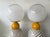Pair of table or bedside lamps in brass, and orange and white Berlingo stripe Murano glass white smoke globe shades....