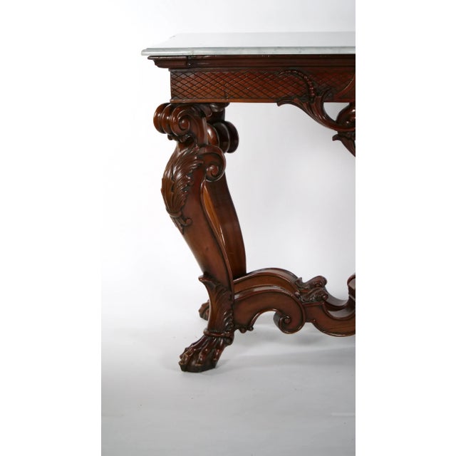 19th century hand carved mahogany wood Rococo style foyer, console table or sofa table. The foyer / console table is made...