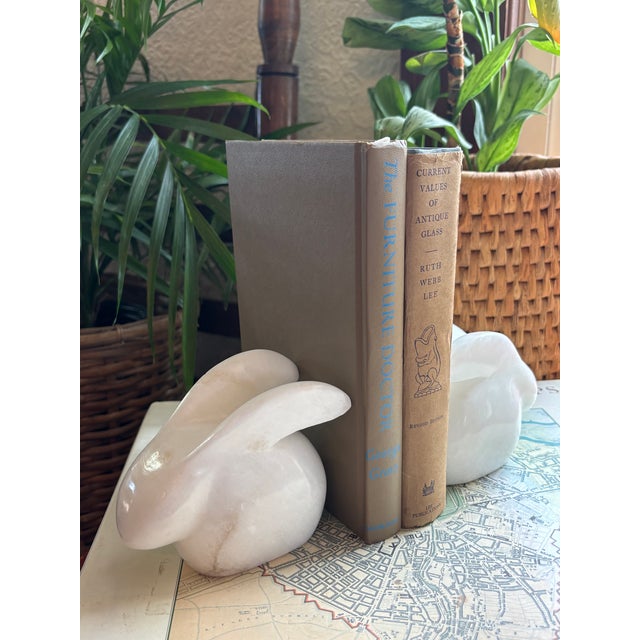 Vintage carved stone modern rabbit bookend pair. Made of a pure white alabaster Please see condition details noted. Most...