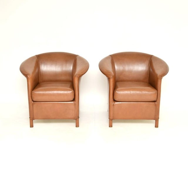 A stylish and very comfortable pair of vintage leather armchairs by Wittmann. They were made in Austria, they date from...
