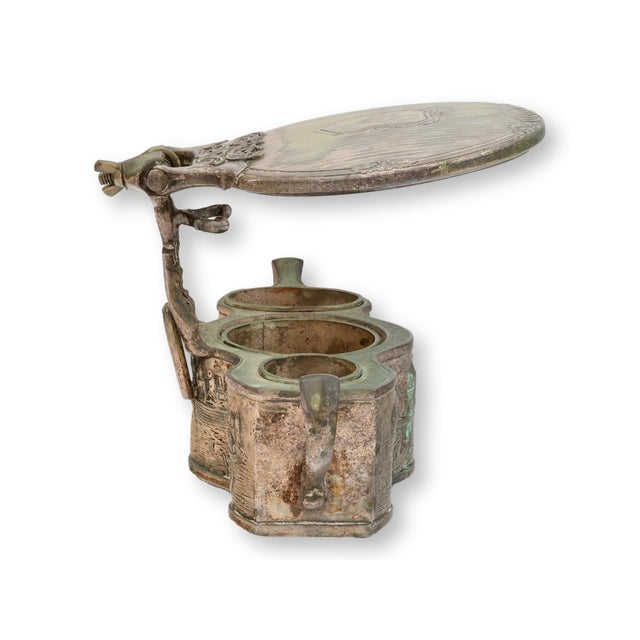 Late nineteenth century silverplate shaving (or vanity) mirror with detailed decoration and three removable cups. Perfect...