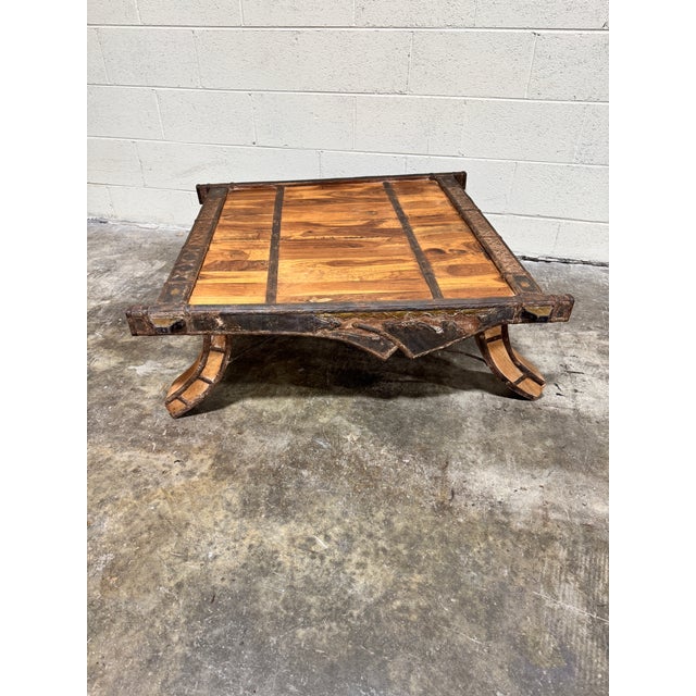 You know it. You love it. Great rustic coffee table ready to go. Brass and metal detail accents.