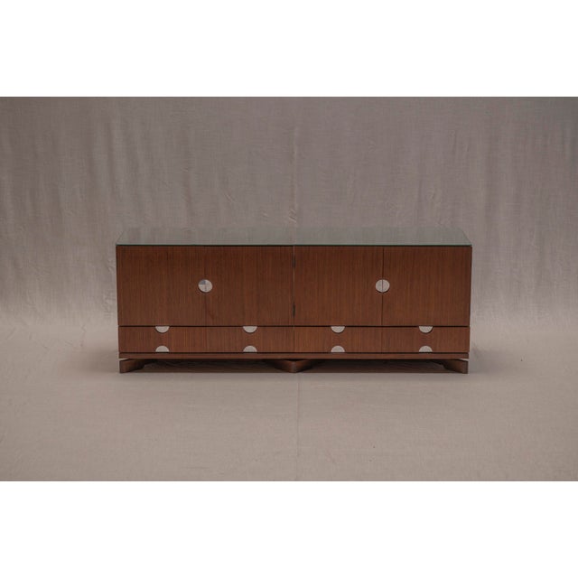 An exceptional Italian modular sideboard by Luigi Caccia Dominioni, dating from the 1970s. Combining architectural...