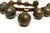 An antique late 19th century set of 13 graduated brass sleigh bells mounted on a leather belt, creating a wonderful...