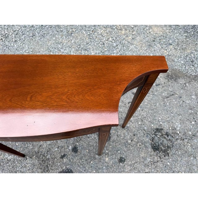 Vintage Hepplewhite Style Mahogany and Burked wood inlaid Console Table. It features with fluted legs, burledwood inlays...