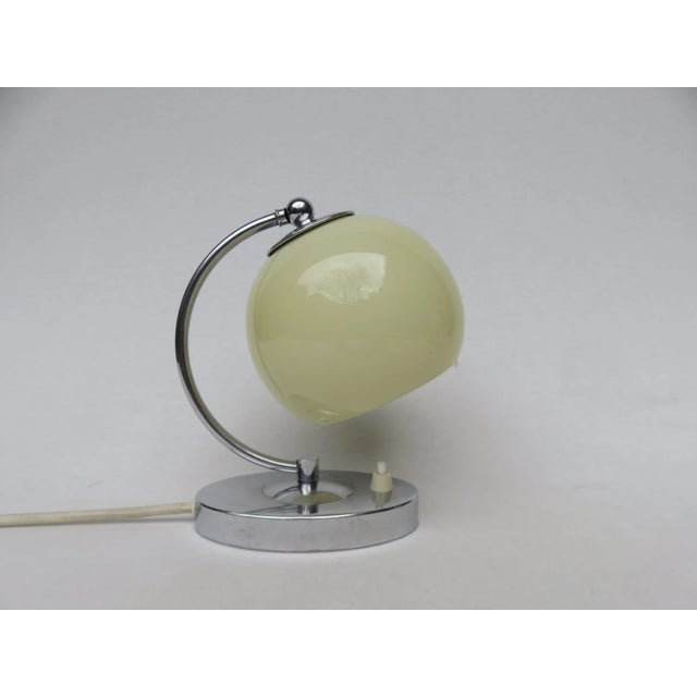 - Lampshades made of overlaid beige glass, which give a warm light - Each holds an E27 socket - Shades can be tilted over...