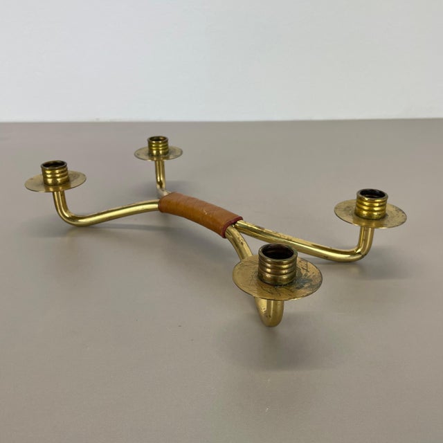 Article: candleholder element Origin: Austria Material: brass and leather Decade: 1950s This original vintage...