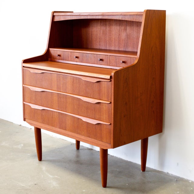 Dimensions: 32 7/8” L x 18” D x 40” H Origin: Denmark Designer: Unknown Manufacturer: Unknown Year: ca 1950s Materials:...