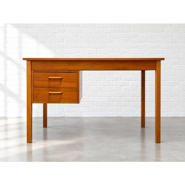 Apartment sized Mid Century Modern Danish Teak Desk, circa 1960s. Perfectly sized for an apartment or smaller office space...