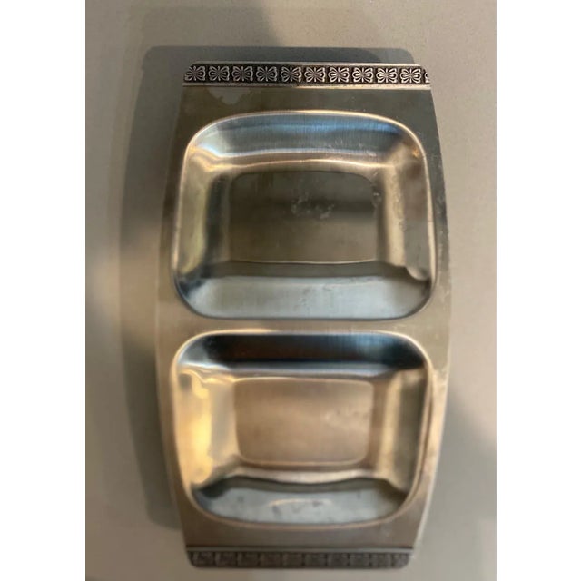 Set of 3 vintage mid century modern stainless steel appetizer dishes with flower motif on handles. Made in Japan.