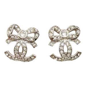 Chanel Silver CC Ribbon Bow CC Crystal Piercing Earrings, A Pair
