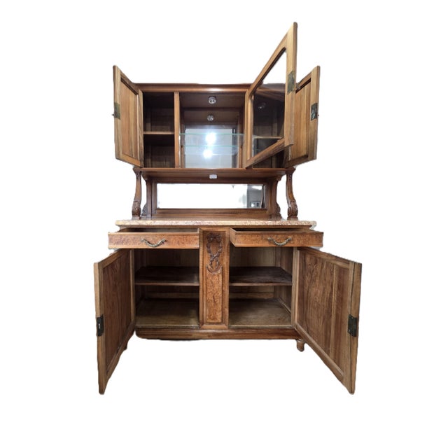 An exceptional French Belle Époque buffet à deux corps (two-part cabinet) in beautifully preserved French walnut and high-...