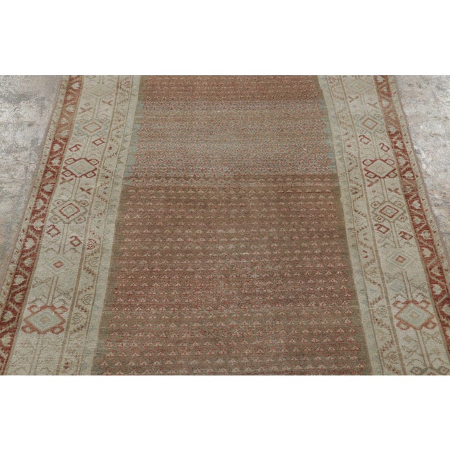 Hand-knotted in wool, this 4x6 antique Persian Malayer rug, circa 1900-1920, is an eclectic addition to Rug & Kilim’s...