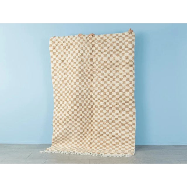 Tiny Sand Check is a contemporary Berber rug that consists of 100% high-quality Atlas wool - soft and cozy under your...