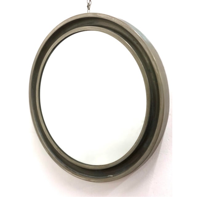 Mirror produced in the 1960s by Artemide and designed by Sergio Mazza. Nickel-plated brass frame. Reflective glass...