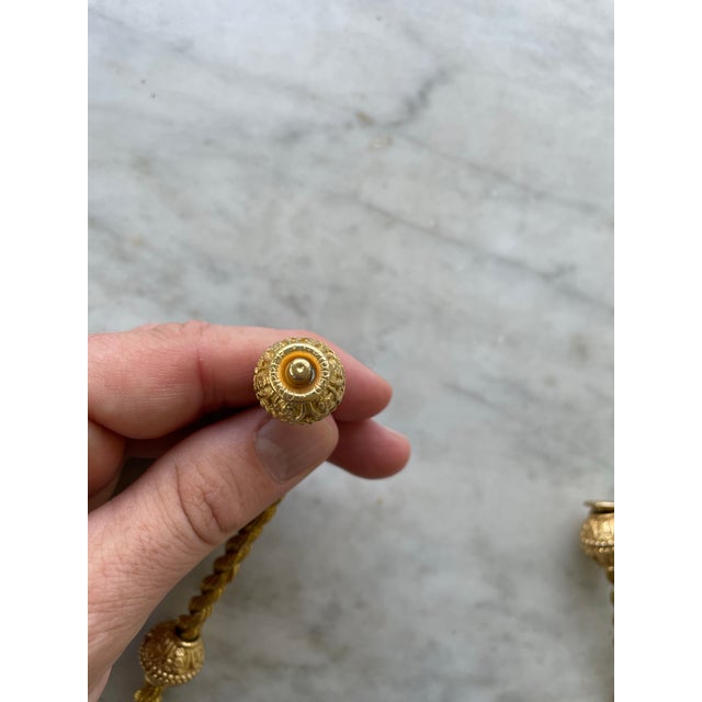 Unleash your inner fashionista with this stunning Vintage Gold Tone Necklace. With its 1980s style, this necklace will add...