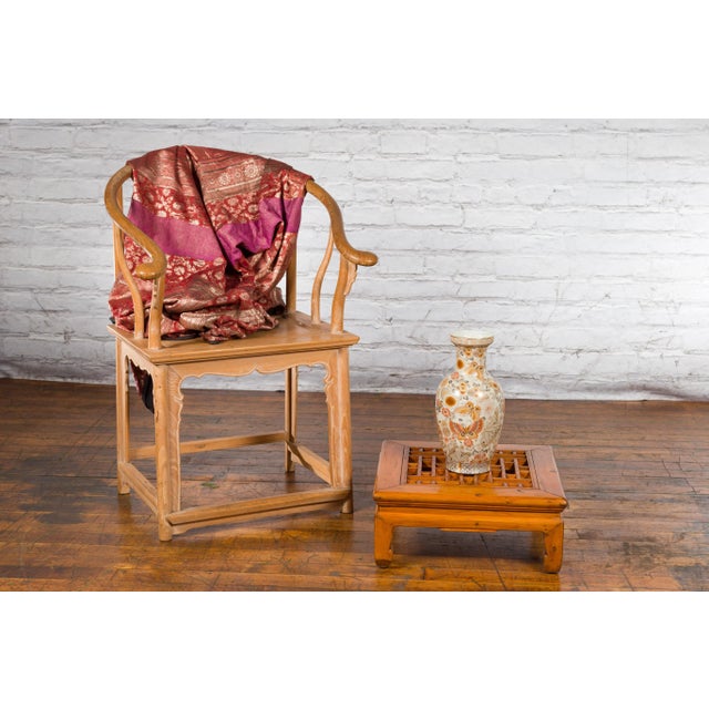 A vintage Chinese Ming style elmwood prayer table from the mid 20th century, with fretwork top and horse hoof feet....