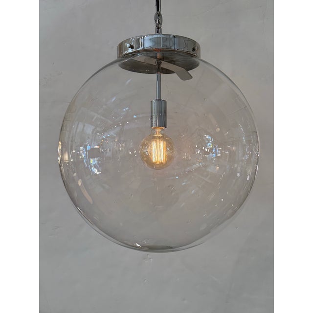 Design Plus Gallery presents the Parisian Architectural Clear Glass Poste Pendant from Restoration Hardware. Inspired by...