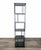 Features a minimalist, industrial-inspired design with a slim metal frame and a staggered shelf arrangement. Brand: West...