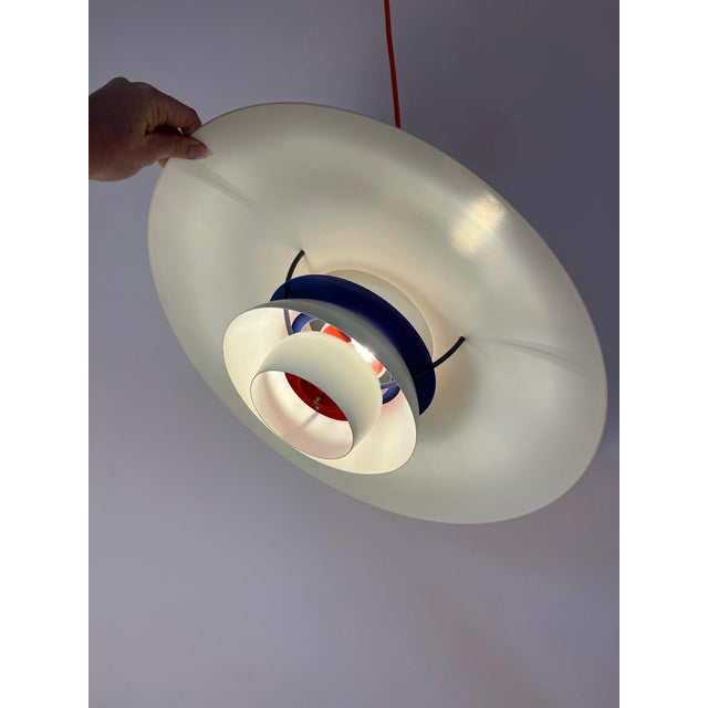 The ph5 pendant lamp by poul henningsen for louis poulsen is the ultimate symbol of danish lighting design. Since its...