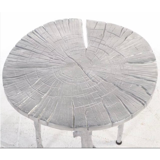 Beautiful sculptural side table by renowned designer Michael Aram from his "Enchanted Forest collection. Features" a round...
