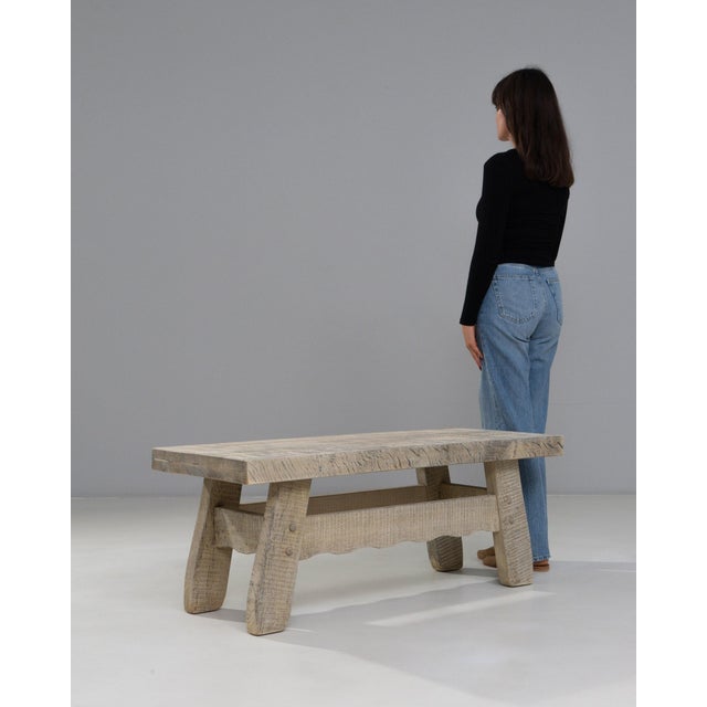 This 20th Century French Oak Coffee Table features a substantial plank top and sculpted base that highlight the expressive...