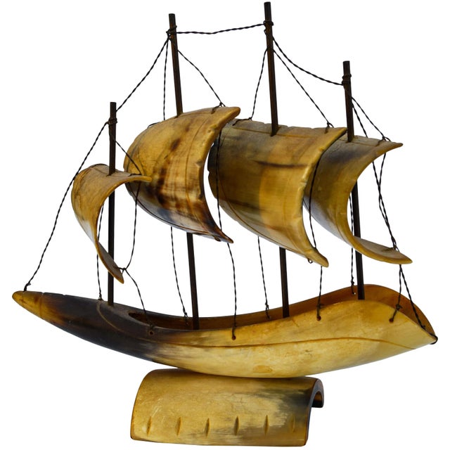 Midcentury handcrafted natural horn ship with intricate and elegant details.